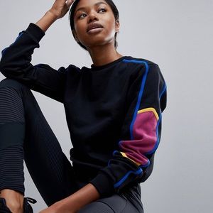 ASOS STRIPE SLEEVE SWEATSHIRT - The Wilds TV